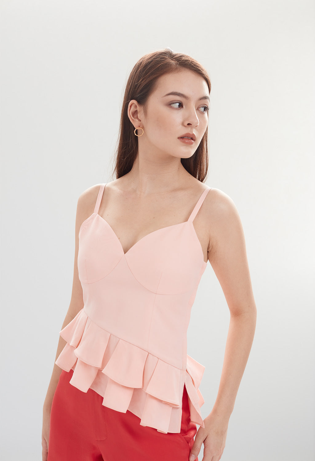 Asymmetrical Ruffle Peplum Sleeveless Top in Peony Pink