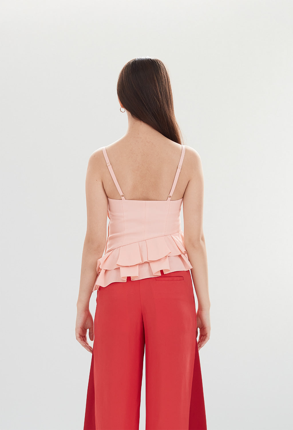 Asymmetrical Ruffle Peplum Sleeveless Top in Peony Pink