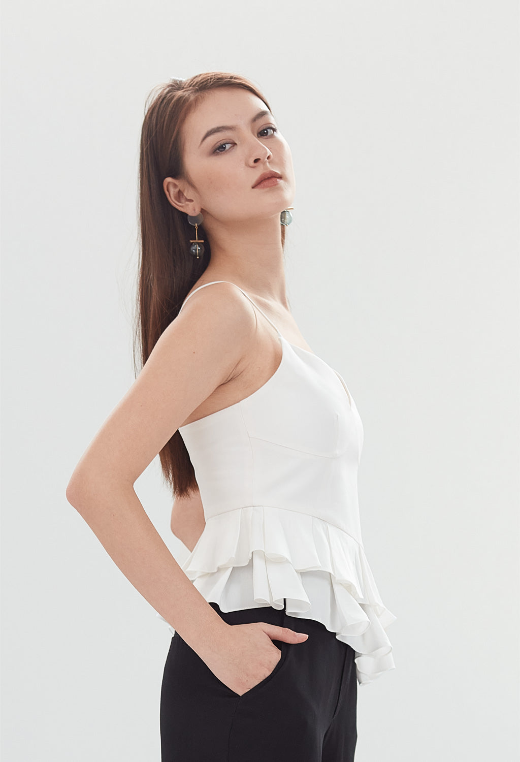 Asymmetrical Ruffle Peplum Sleeveless Top in White